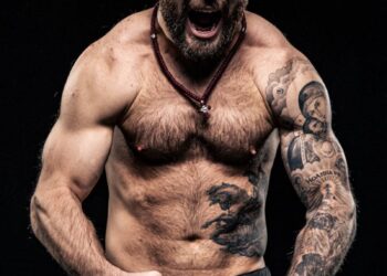 Shouting Shirtless Bodybuilder with Tattoos