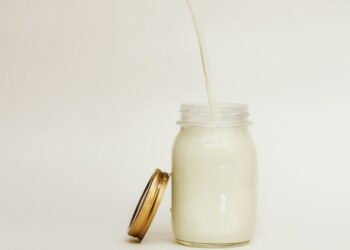 mason jar filled with smoothie