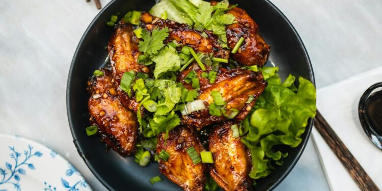 cooked food on black ceramic bowl