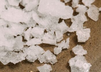 white snow on brown sand