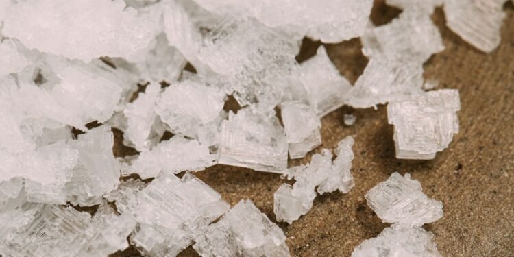white snow on brown sand