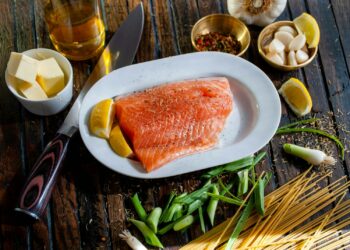 flat lay photography of raw salmon fish