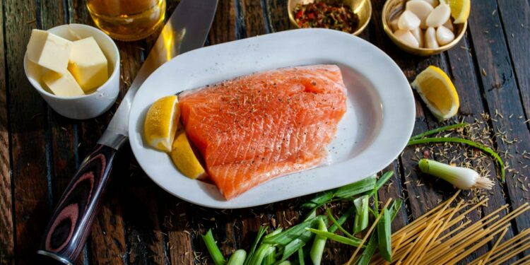 flat lay photography of raw salmon fish