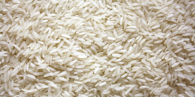 a pile of white rice sitting on top of a table