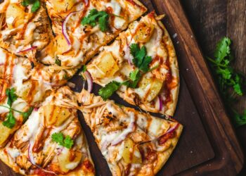 pizza on chopping board