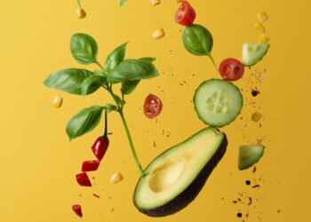 green and red fruit with green leaves