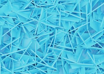 a large pile of blue plastic shards