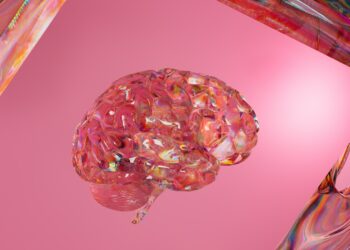 A close up of a pink object on a pink background