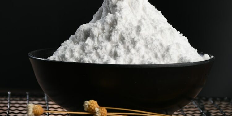 white powder on black bowl