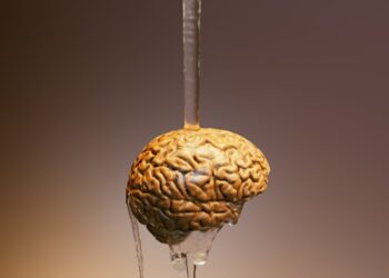 A drop of water with a human brain hanging from it