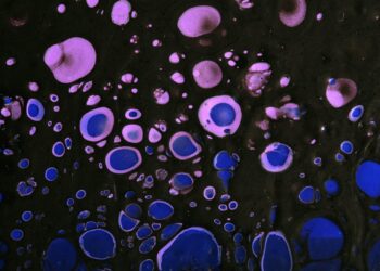 A close up of blue and black bubbles